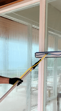 Sparkling glass window after professional internal and external clean in a Sydney home